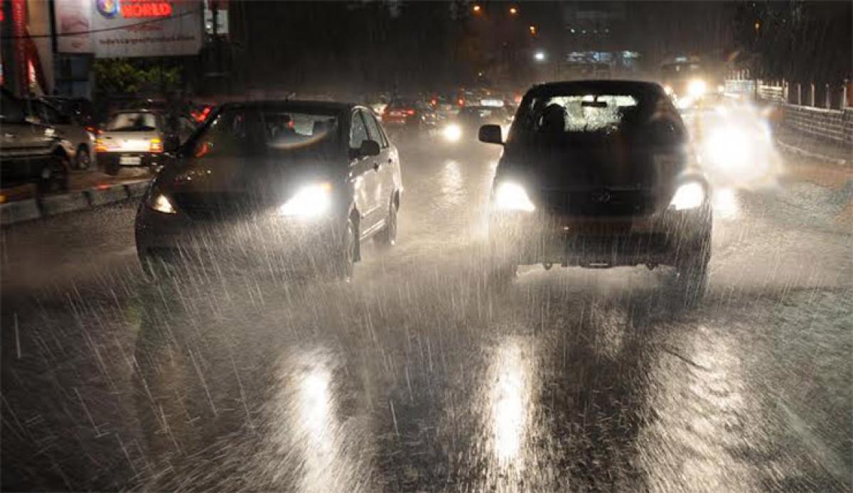 Rain god smiles; heavy downpour lashes city